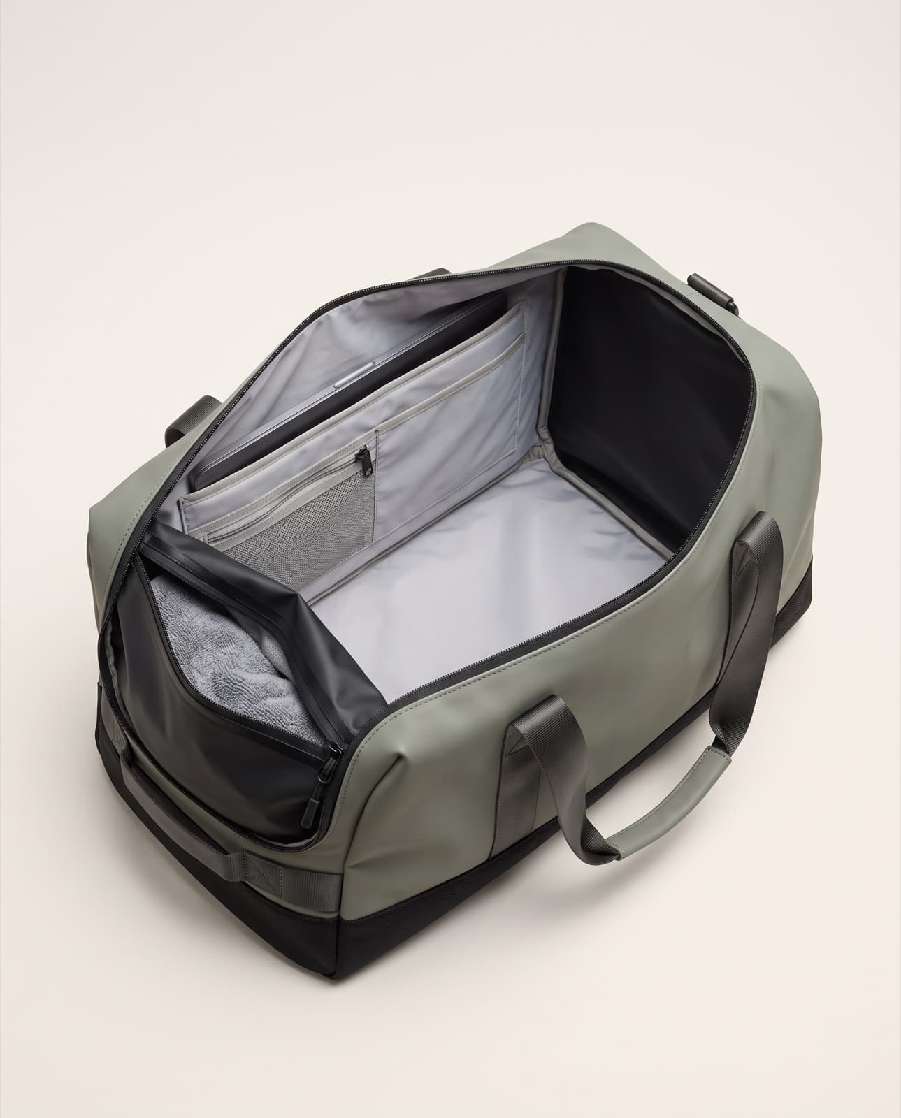 Interior of the Duffel 40: laptop sleeve, organiser and welded wet pouch