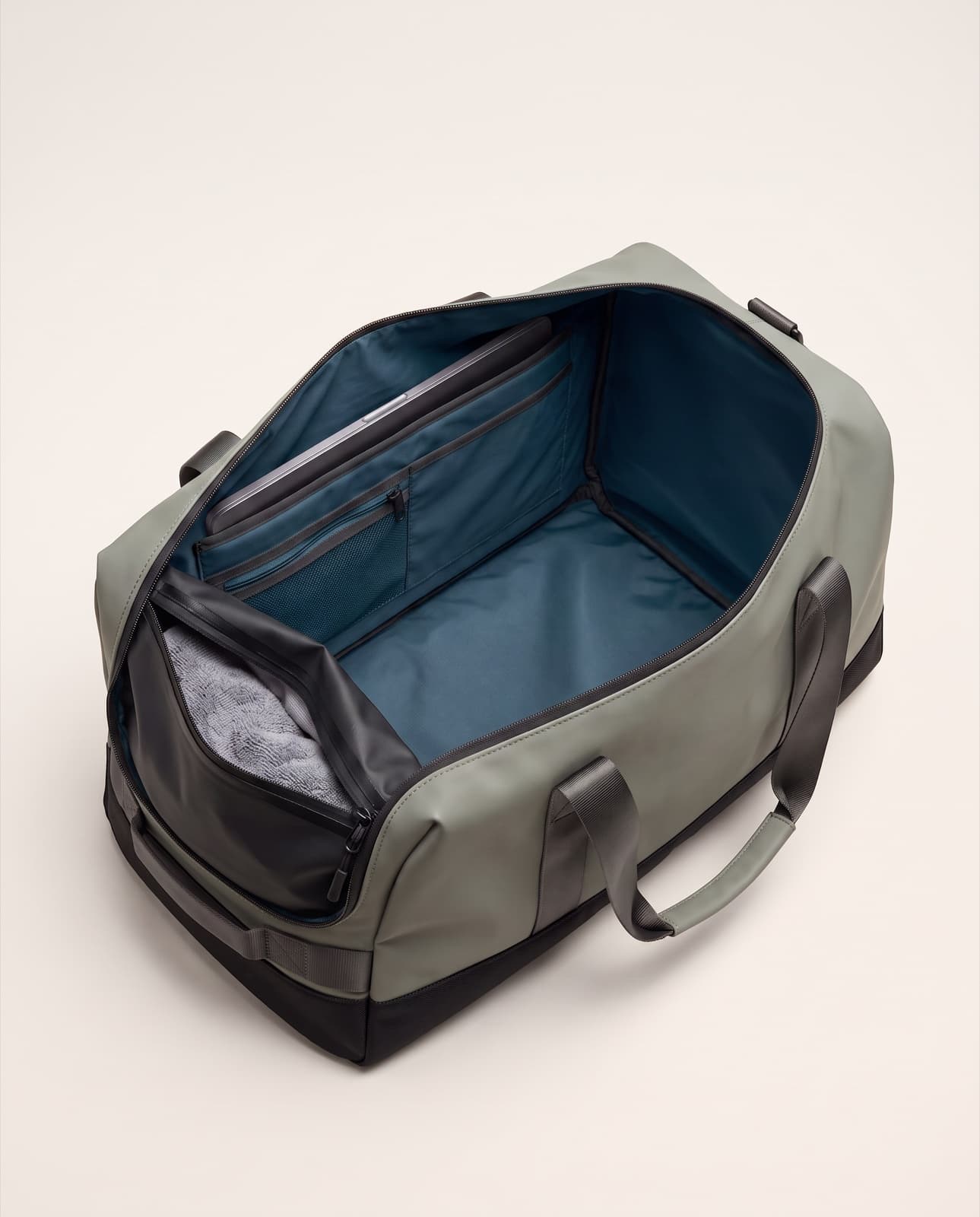 Interior of the Duffel 50: laptop sleeve, organiser and welded wet pouch