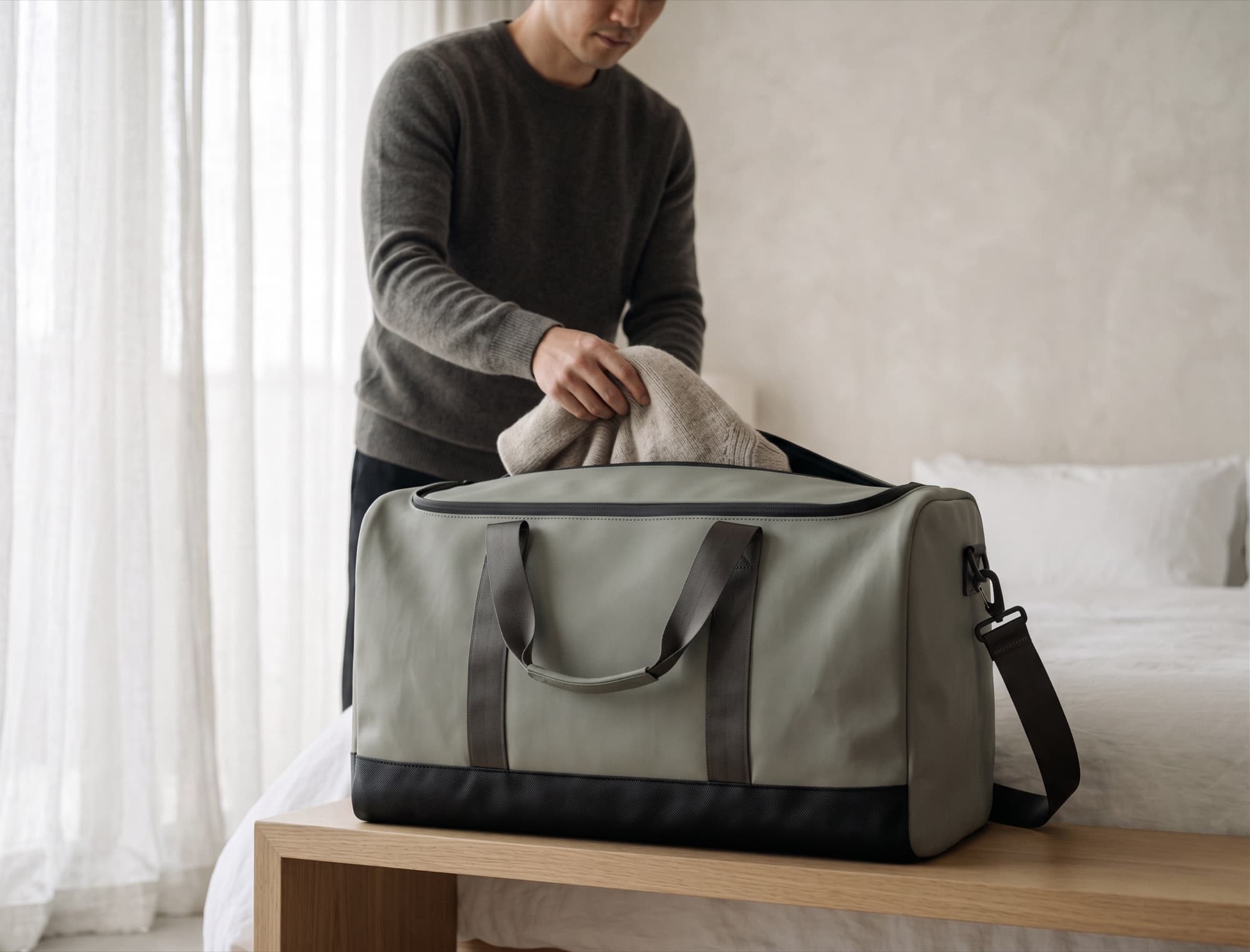 Unpacking on a hotel luggage bench in morning light