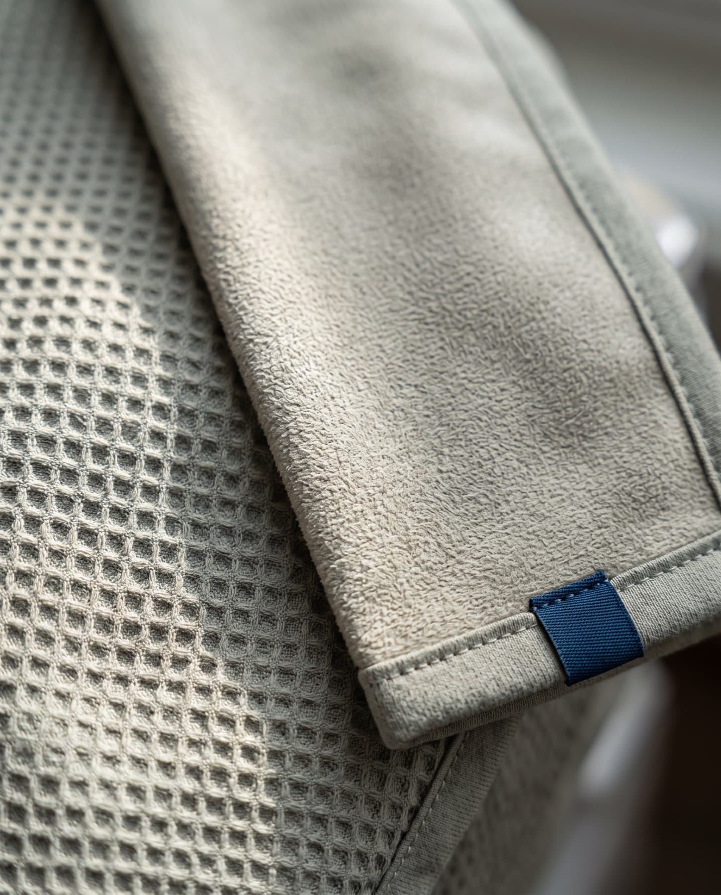 Close-up of a two-face microfibre towel, waffle and suede