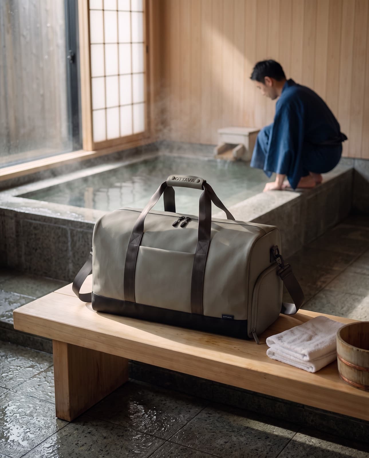 Duffel 40 on a hinoki bench in a Tokyo onsen bathhouse
